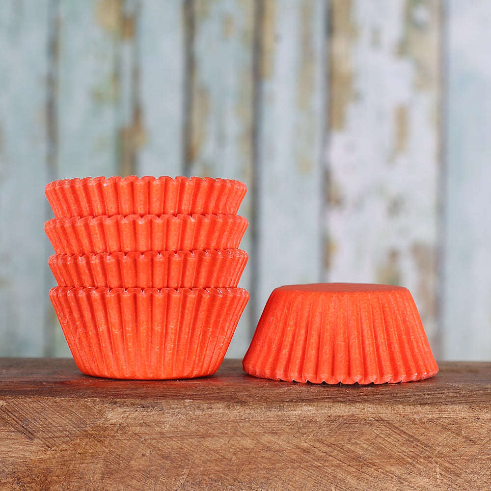 Bulk Mini Orange Cupcake Liners: Solid | www.sprinklebeesweet.com