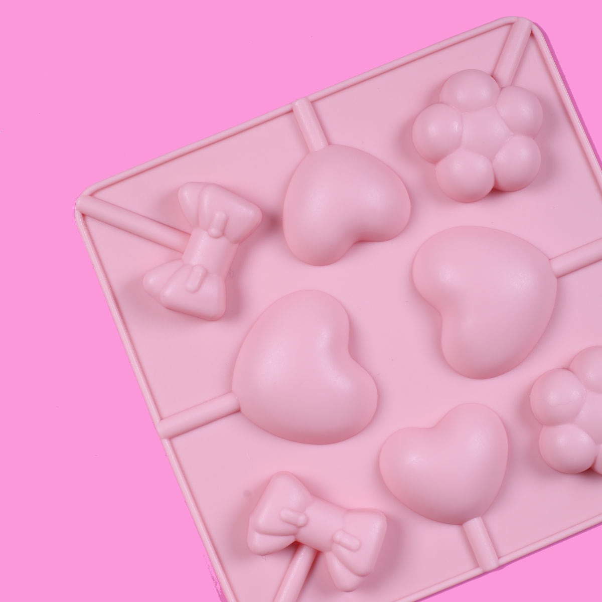 Silicone Lollipop Mold: Heart, Flower & Bow | www.sprinklebeesweet.com