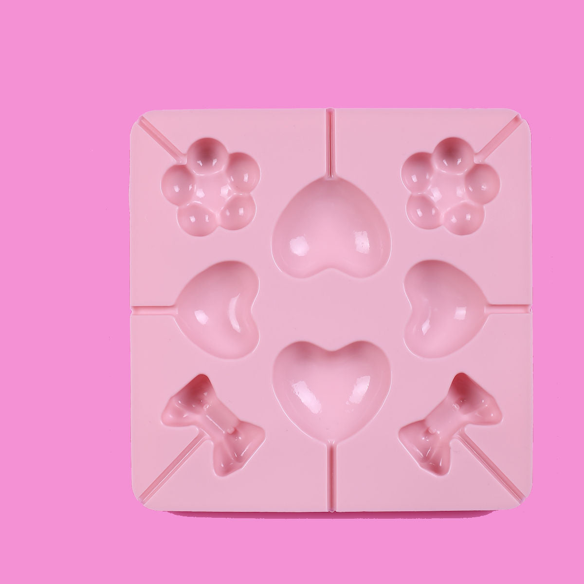 Silicone Lollipop Mold: Heart, Flower & Bow | www.sprinklebeesweet.com