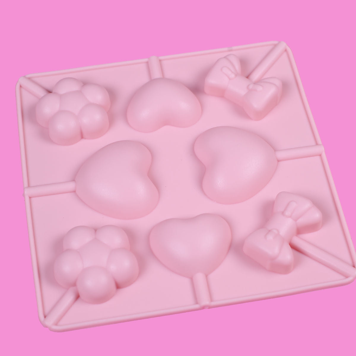 Silicone Lollipop Mold: Heart, Flower & Bow | www.sprinklebeesweet.com