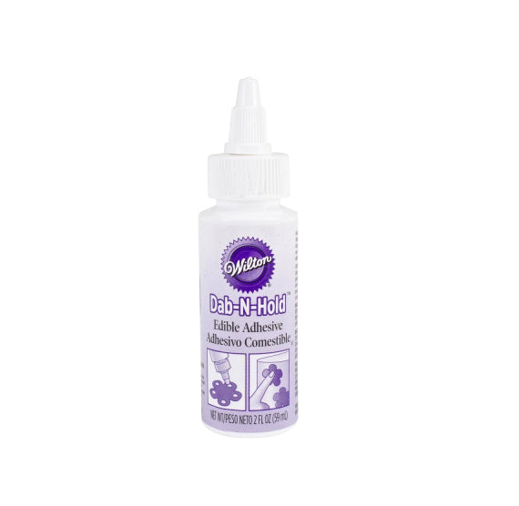 Wilton Dab-N-Hold Edible Adhesive | www.sprinklebeesweet.com