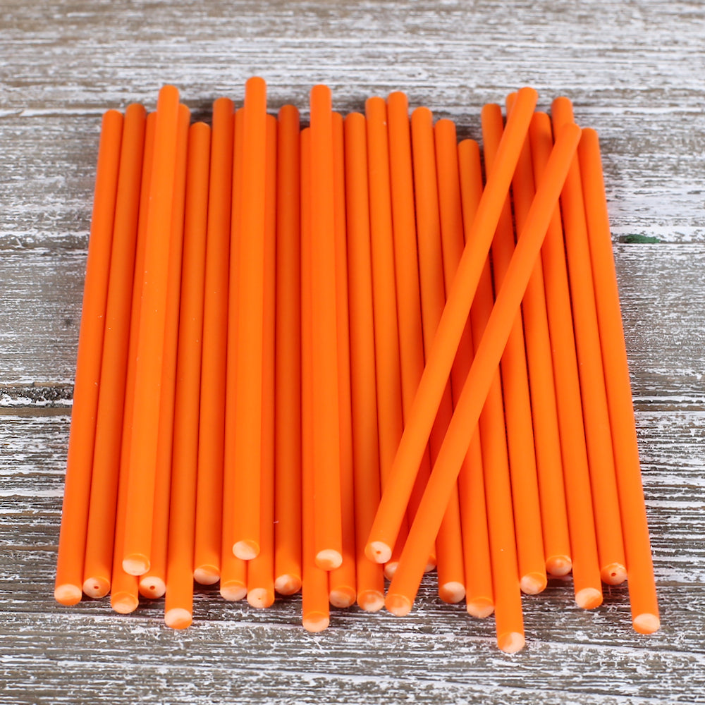 Bulk Orange Lollipop Sticks: 6" | www.sprinklebeesweet.com