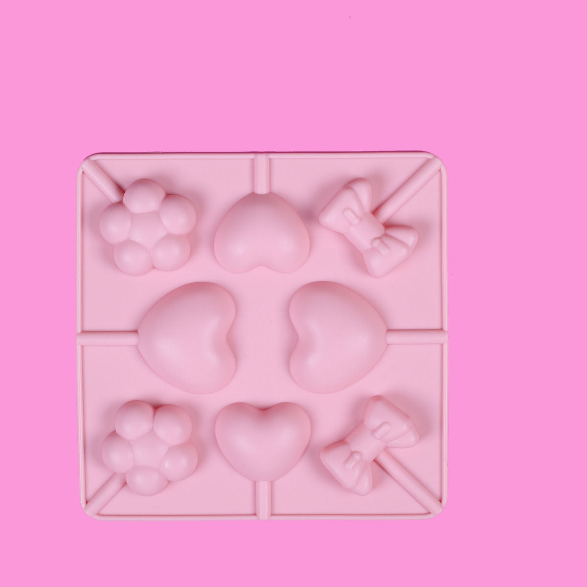Silicone Lollipop Mold: Heart, Flower & Bow | www.sprinklebeesweet.com